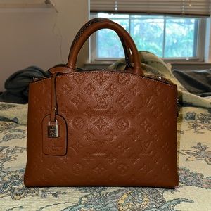 Louis Vuitton brown handbag with locket and adjustable removable strap